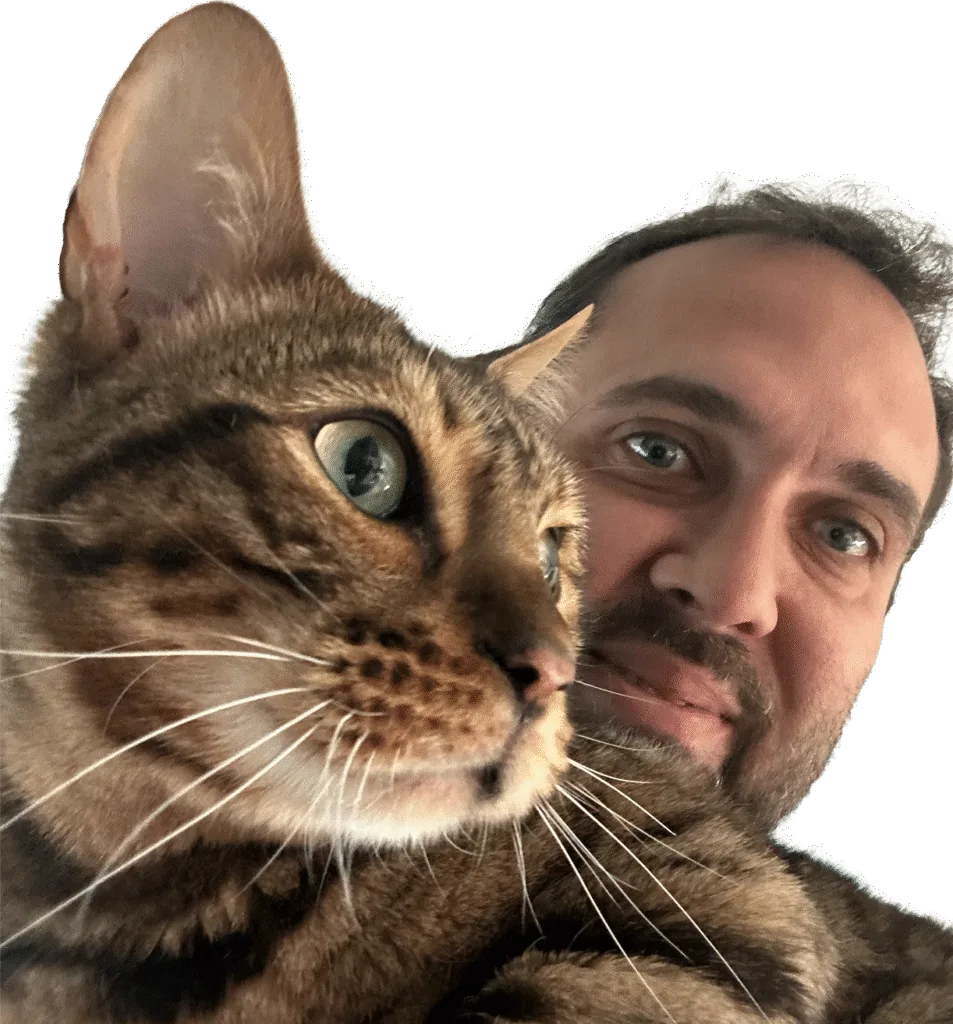 Cat sitter Felipe holding a bengal cat